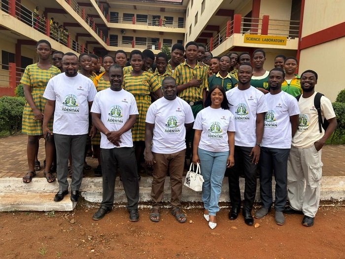 The team with students in the school after the programme