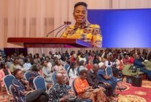 Ms Esther A. N. Cobbah (inset) addressing participants at the event