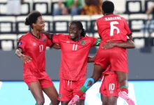 Tabitha Chawinga celebrates her opener with teammates