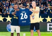 Toku (left) being introduced to Buriam FC fans in the the league