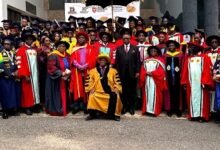 The University Management and graduates at the graduation ceremony