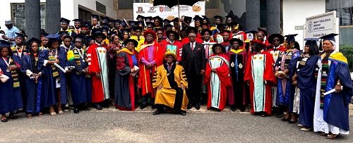The University Management and graduates at the graduation ceremony