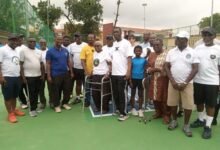 The chairman of the Power Tennis Club, Mr Arhin Owusu-Afriyie (third from left) with members of ECG staff and the tennis club