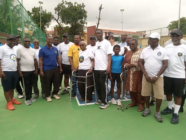 The chairman of the Power Tennis Club, Mr Arhin Owusu-Afriyie (third from left) with members of ECG staff and the tennis club