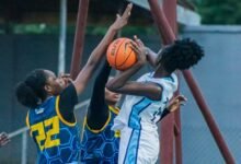 Braves defenders close in on a Navy player to deny her a shot