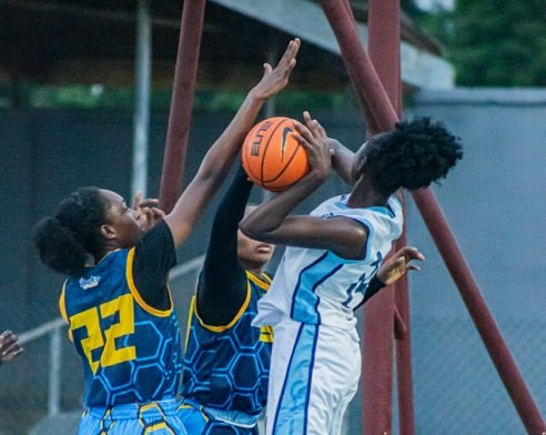 Braves defenders close in on a Navy player to deny her a shot
