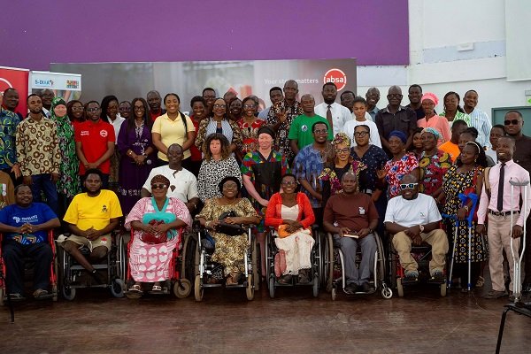 Absa team with PWDs after the programme