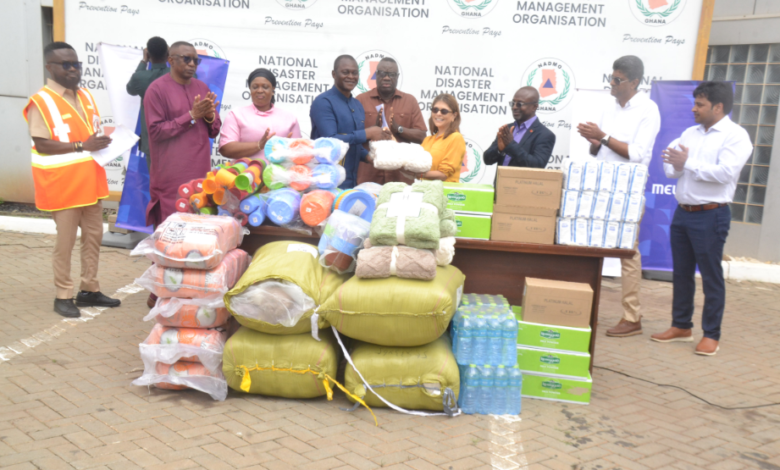 Major (Rtd) Joseph Kuyon (fourth from left) receiving the items from Ms Sobya Sadhwani during the presentation. With them is Dr Mohammed Awal (middle) Photo Victor A. Buxton