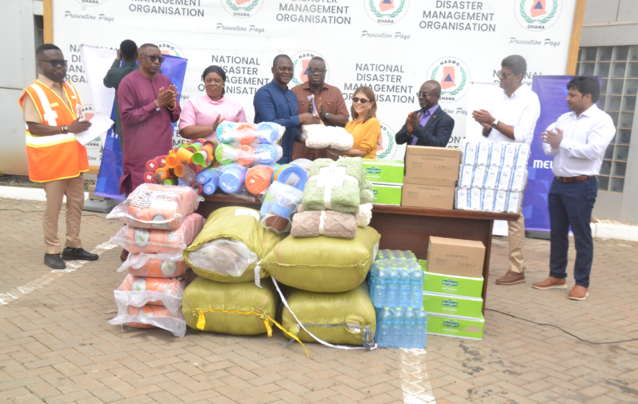 Major (Rtd) Joseph Kuyon (fourth from left) receiving the items from Ms Sobya Sadhwani during the presentation. With them is Dr Mohammed Awal (middle) Photo Victor A. Buxton
