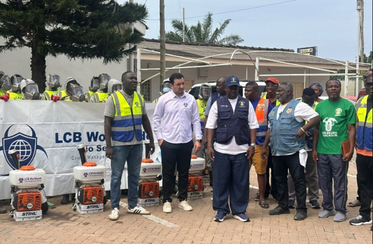 Fiifi Buabeng-Baiden (first from left), Dr. Akoriyea (third from left) and some officials from the two organisations before the commencement of the fumigation exercise