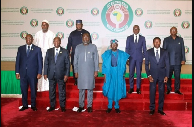 Nigeria's President, Bola Ahmed Tinubu, (fourth left) poses for a group photo with other ECOWAS leaders