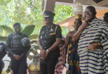 Asantehene, Otumfuo Osei Tutu II (right) with the IGP's delegation
