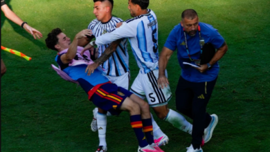 Argentina's Leandro Paredes push Spain substitute Gavi after the final whistle