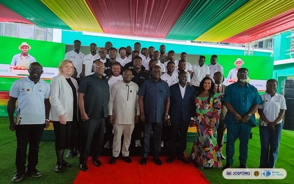 Mr Opoku (middle) with other dignitaries and the graduates at the programme