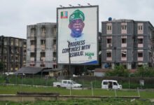 A poster of Nigerian President Bola Tinubu seen on a building in Lagos, Nigeria