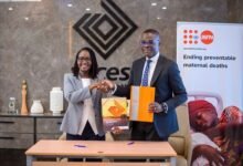 Officials from Access Bank & UNFPA displaying the signed MOU
