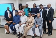 Mr Aboagye (seated middle) with Ms Amoah (seated second right) and other management staff of the company after the programme