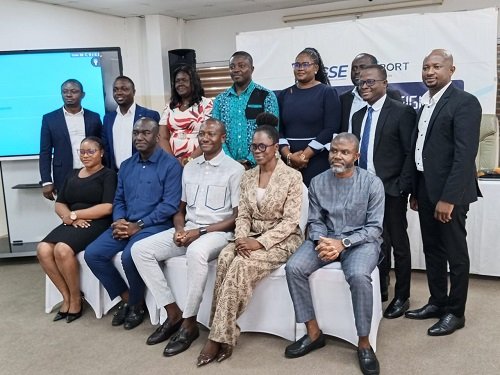 Mr Aboagye (seated middle) with Ms Amoah (seated second right) and other management staff of the company after the programme