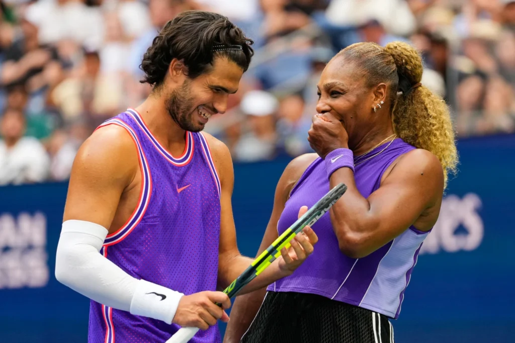 Carlos Alcaraz (left) with Serena Williams