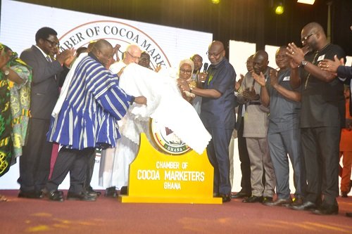 Mr Abbey (fourth from right) being assisted by Naa Dr Alhassan (left) and other dignitaries to launch the Chamber Photo Victor A. Buxton
