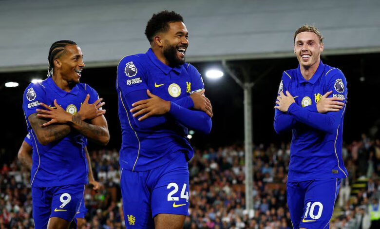 Cole Palmer (left) celebrates scoring the third goal with Joao Pedro and Reece James