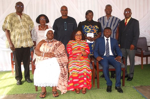 Dr Charity Binka (seated middle) with Dr Isaac Okpoti Nai (seated right) and other board members of NTC after the programme