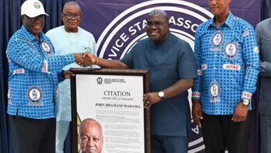 Dr. Debrah (second from right) receiving a citation from Lordship Baffour-Bonnie Photo Geoffrey Buta