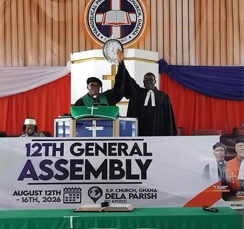 Rt. Rev. Lt. Col. Agbeko (left) introducing Rev. Prof. Amevenku, new Moderator, to the church in Ho