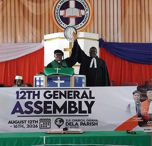 Rt. Rev. Lt. Col. Agbeko (left) introducing Rev. Prof. Amevenku, new Moderator, to the church in Ho