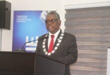 Mr Ludwig Annang Hesse (inset) inducting the new GhIE members into office. Photo Ebo Gorman