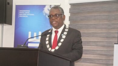 Mr Ludwig Annang Hesse (inset) inducting the new GhIE members into office. Photo Ebo Gorman
