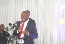 Prof Opuni (inset) addressing stakeholders at the meeting. Photo. Ebo Gorman