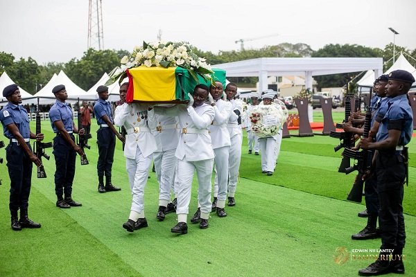 Military pallbearers carrying the remains of the late Ambassador James Victor Gbeho for burial