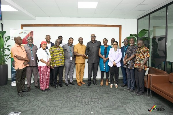 Mr Boateng (sixth from left) with Mr Madjie (sixth from right) and others after the programme