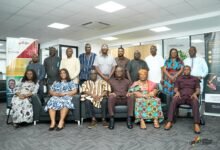 Mr Madjie ( seated third from right) with some Management of the Authority and the Committee members