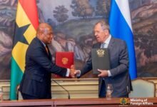 Mr Ablakwa (left) and H.E. Sergey Lavrov exchanging greetings after signing the agreement