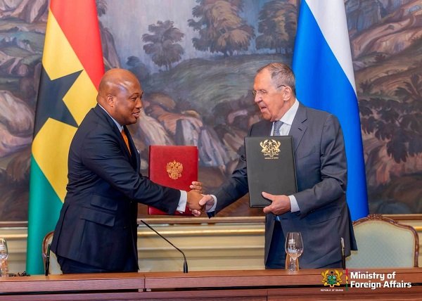 Mr Ablakwa (left) and H.E. Sergey Lavrov exchanging greetings after signing the agreement