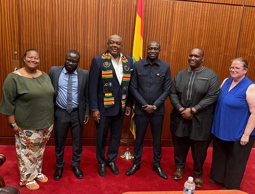 Mr Smith (third from left) with Mr Cook (second from right) and other members to attend the summit