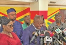 Mr Afenyo-Markin (middle) speaking at the briefing..