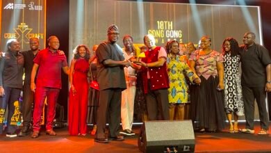 Staff of Publicis West Africa, receiving the award from Mr Ackah (left)