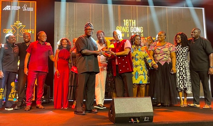 Staff of Publicis West Africa, receiving the award from Mr Ackah (left)