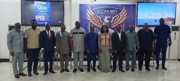 Mr. Abubakari (middle) with some stakeholders after the programme