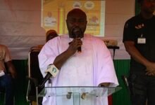 Mr. Be-Awuribe (inset) addressing residents at the programme