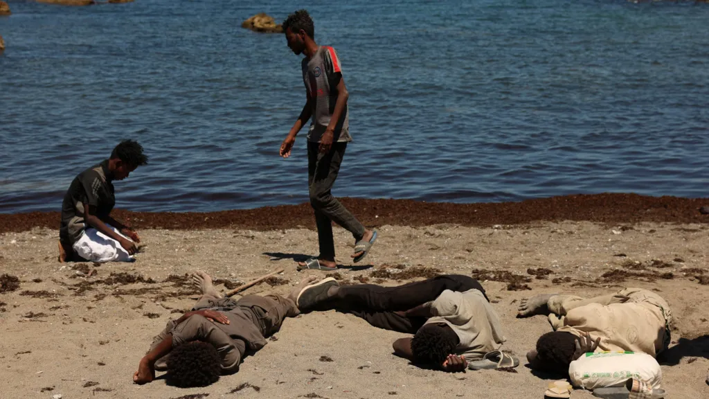 Groups of migrants have been sleeping on the beach in Ceuta