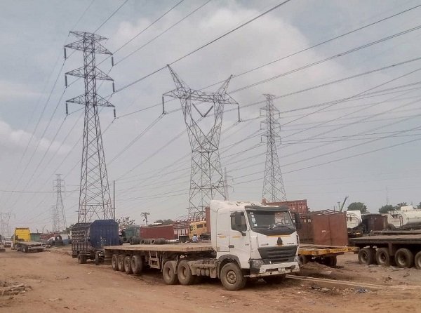 Activities of some artisans and truck operators under the high tension towers