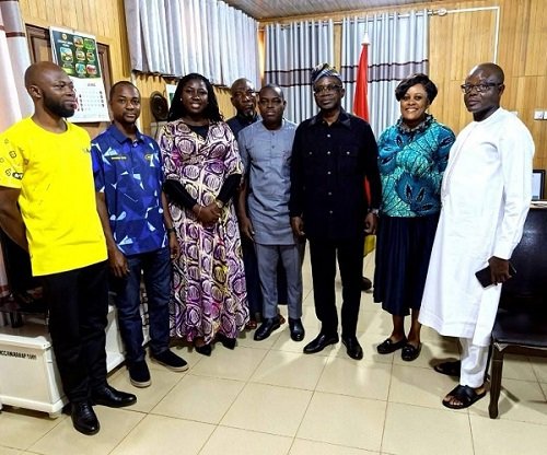 Mr Mburidiba with management of MTN Ghana during the visit