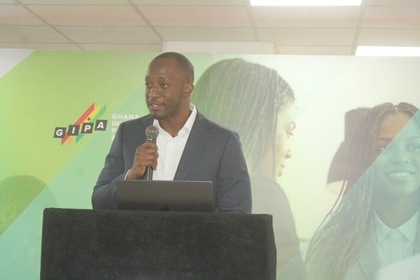 Mr Razak Alhassan (inset) addressing participants at the forum. Photo. Ebo Gorman