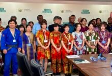JICA volunteers and officials after the meeting