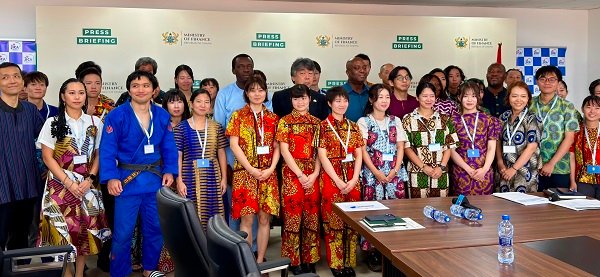 JICA volunteers and officials after the meeting