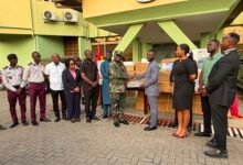 Major General Mantey (seventh from left) receiving the items from Dankwah (fourth from right) at the recemony